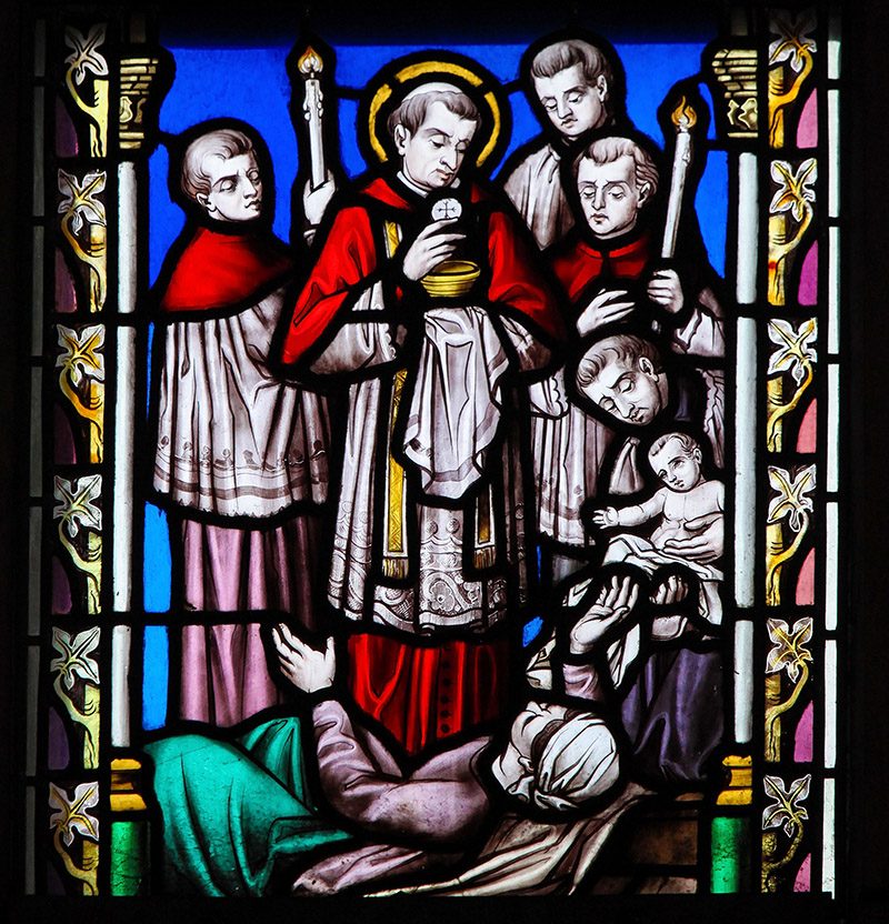 Stained Glass – Saint Carolus BRUSSELS, BELGIUM - MARCH 13, 2017: Stained Glass in the Church of Our Blessed Lady of the Sablon in Brussels, Belgium, depicting Saint Charles Borromeo or Carolus Borromeus